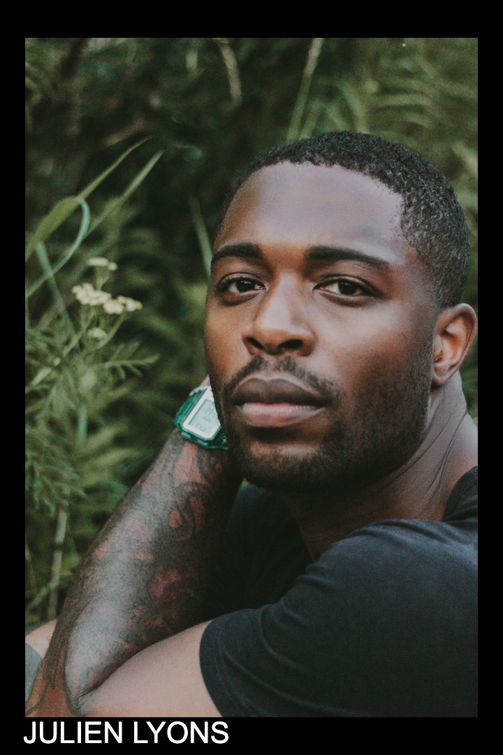 Julien Lyons — close portrait, hands folded